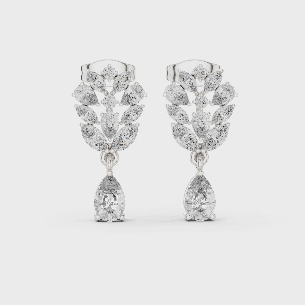 Pear, marquise and round lab-grown diamond cluster drop earrings in white gold, 360 degree video
