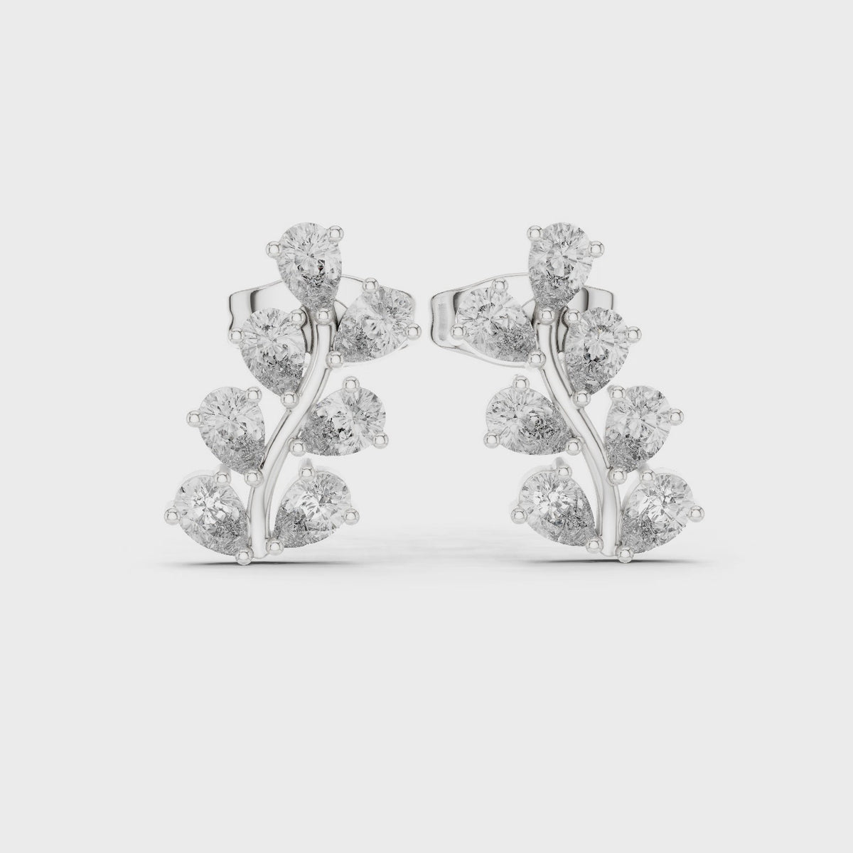 Pear lab-grown diamond cluster stud earrings in white gold, 360 degree video