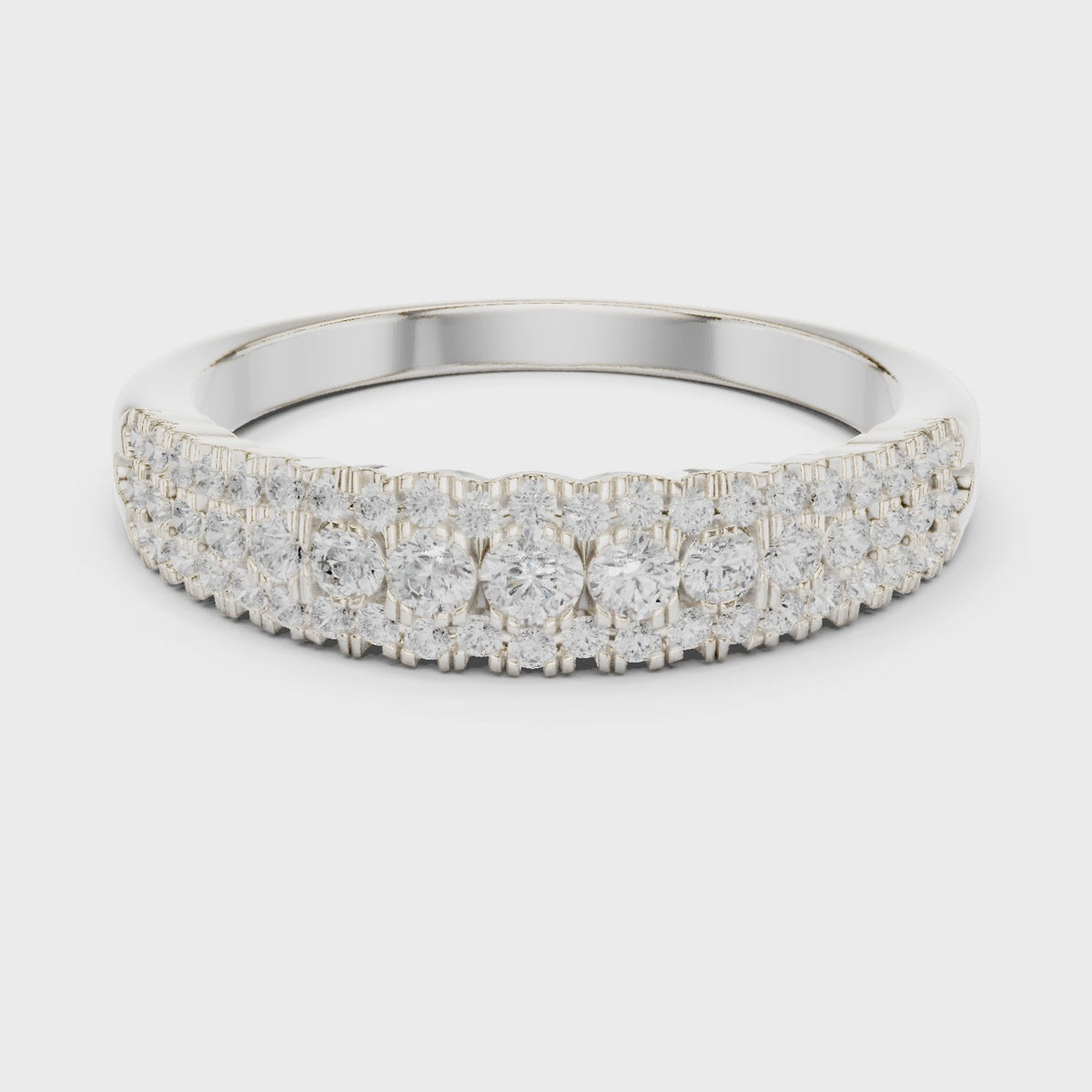 Round lab-grown diamond triple-row anniversary band in white gold, 360 degree video