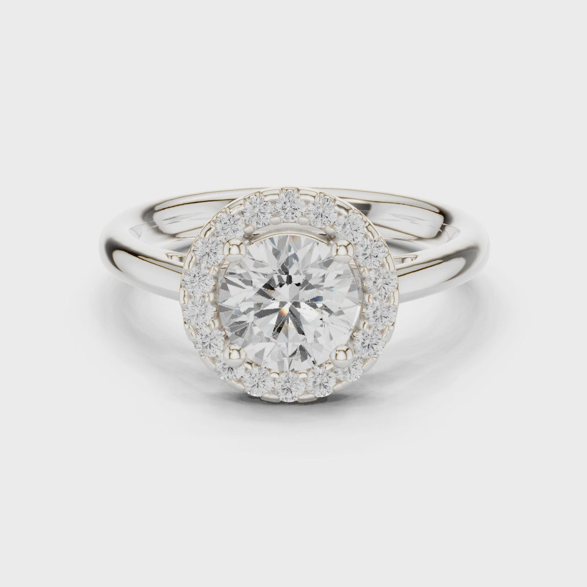Round lab-grown diamond halo engagement ring in white gold, 360 degree video