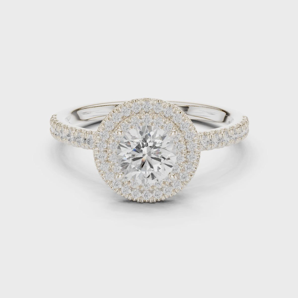 Round lab-grown diamond halo engagement ring in white gold, 360 degree video