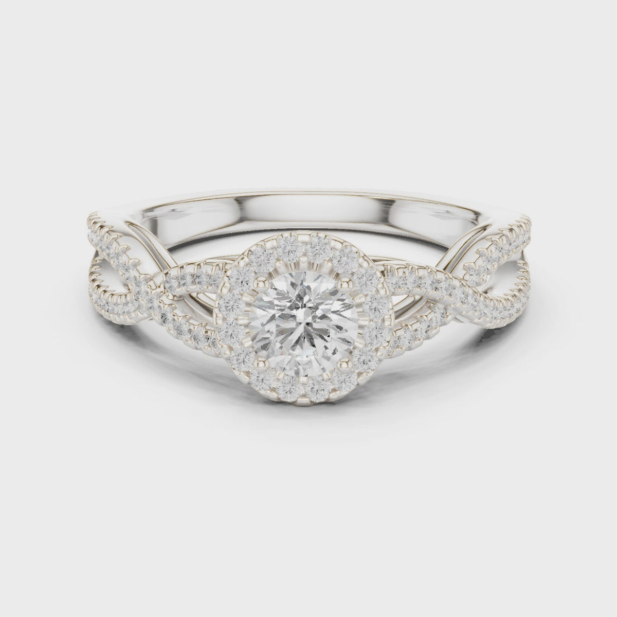 Round lab-grown diamond twisted halo engagement ring in white gold, 360 degree video